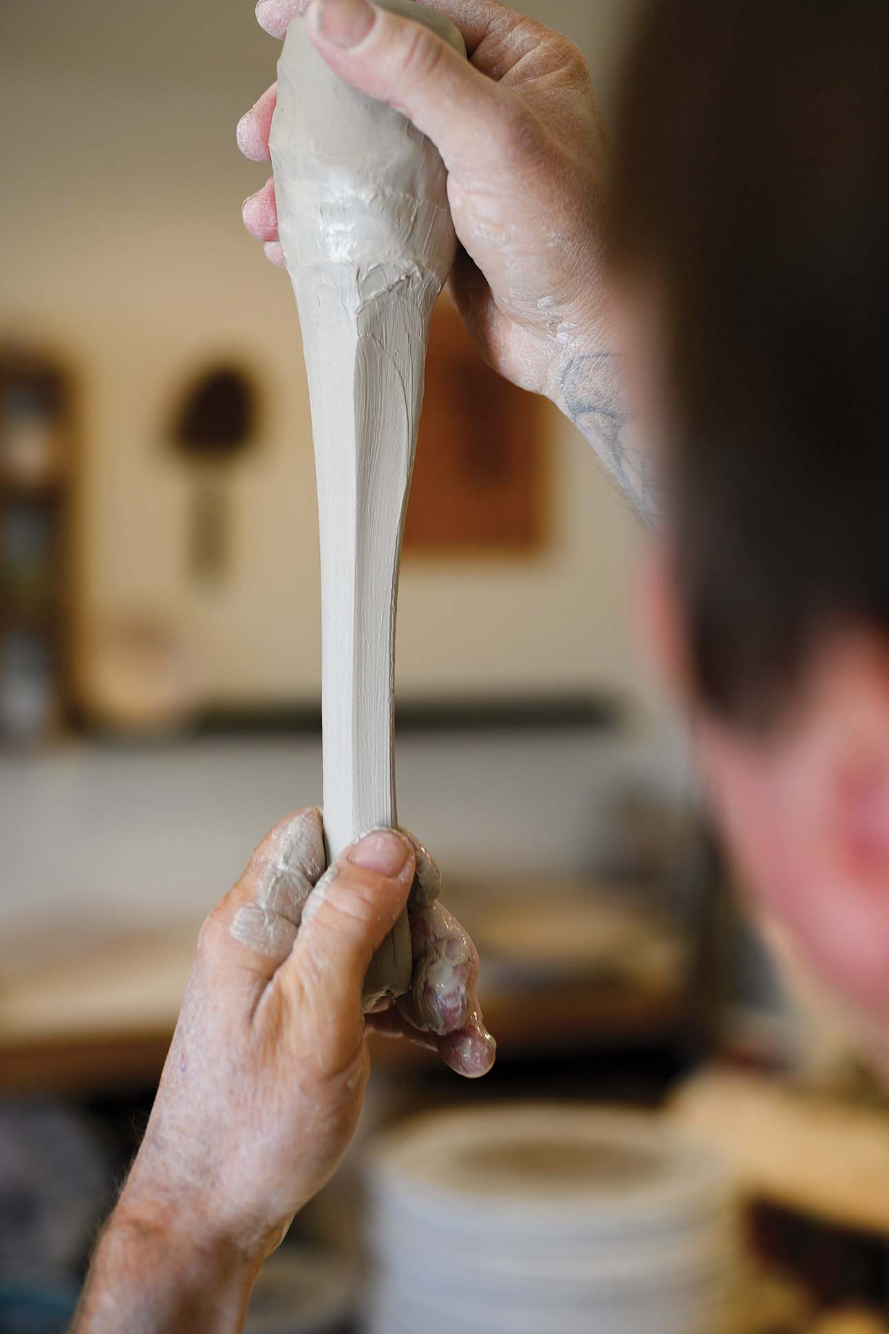 a person holding a white object