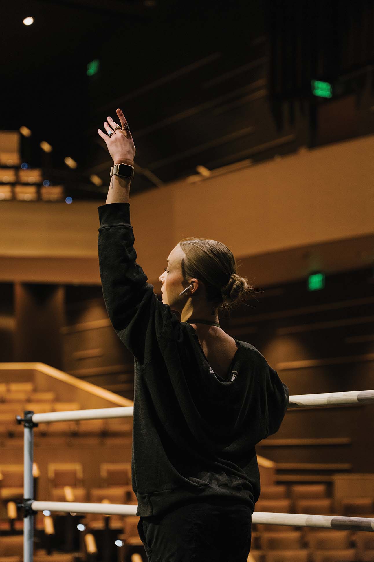 a person raising her hand