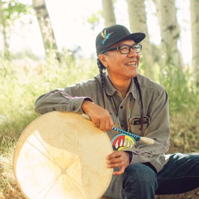 a person holding a drum