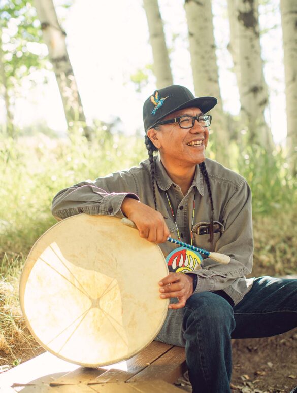 a person holding a drum