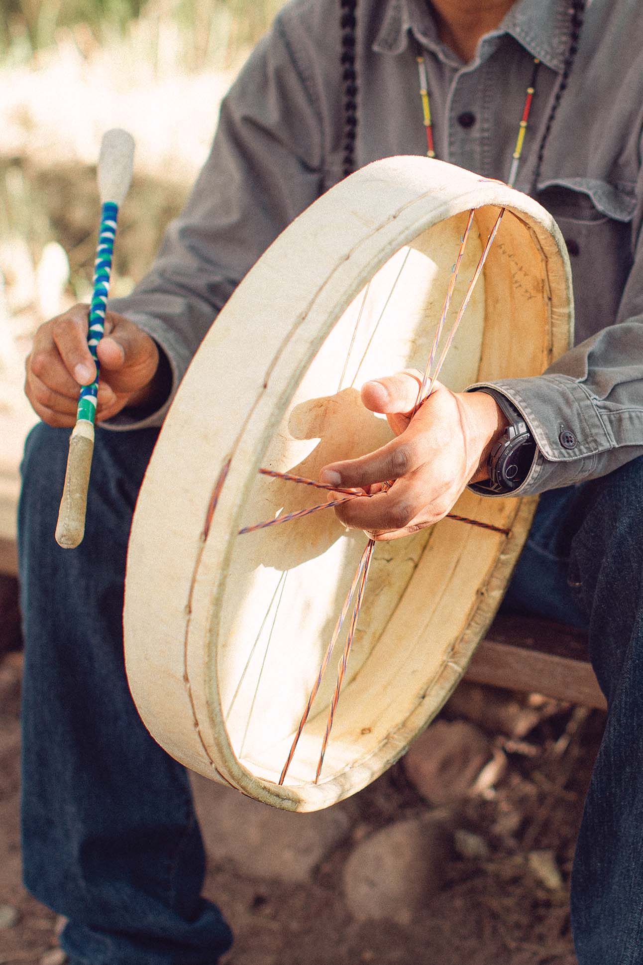 a person holding a drum