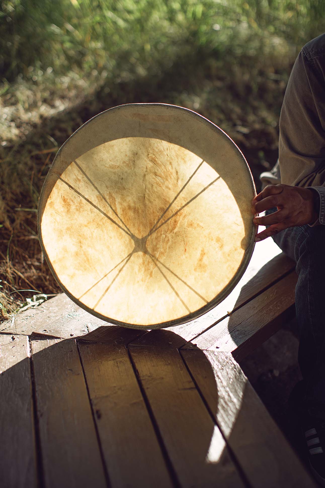 a person holding a drum