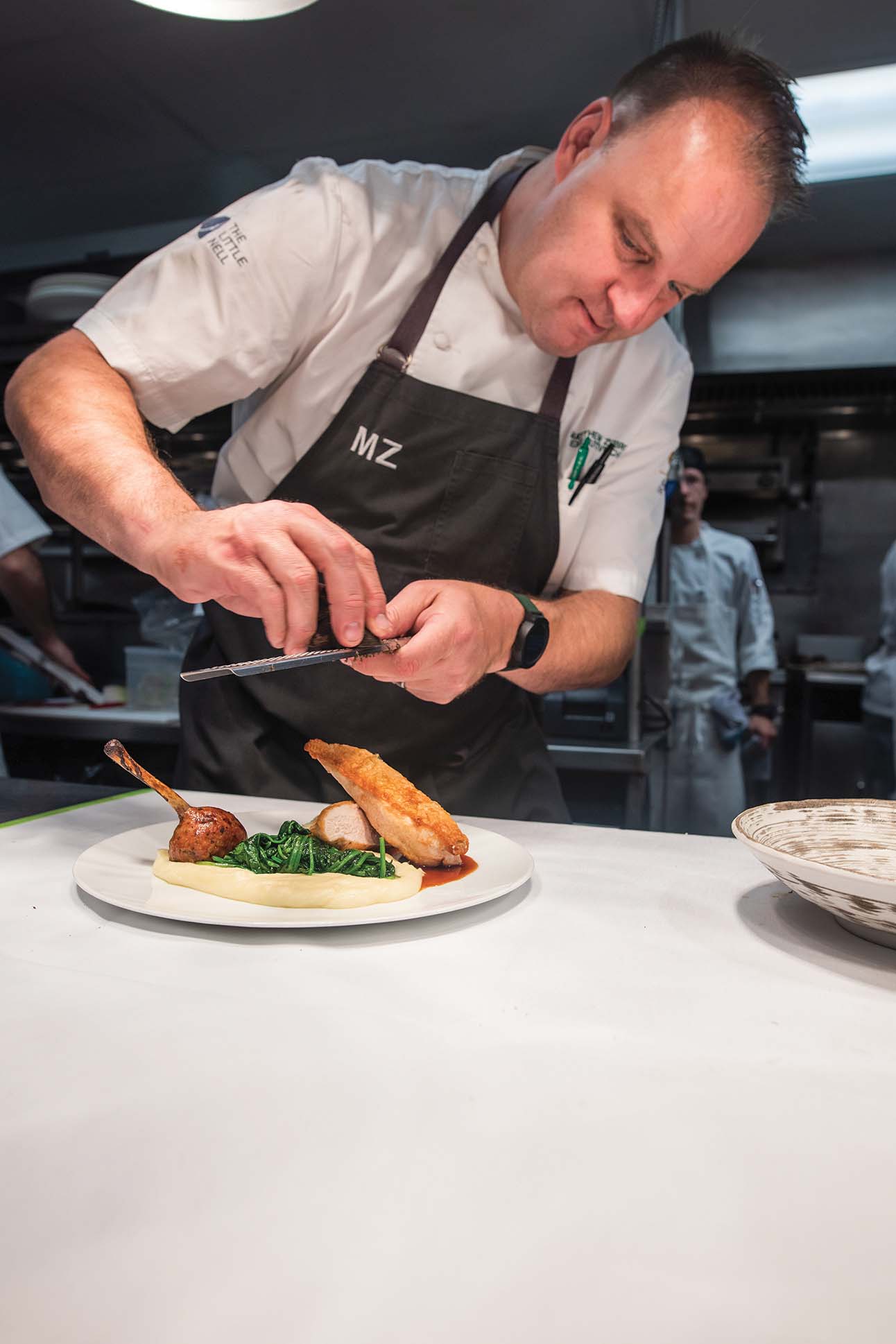 a person in a chef's kitchen