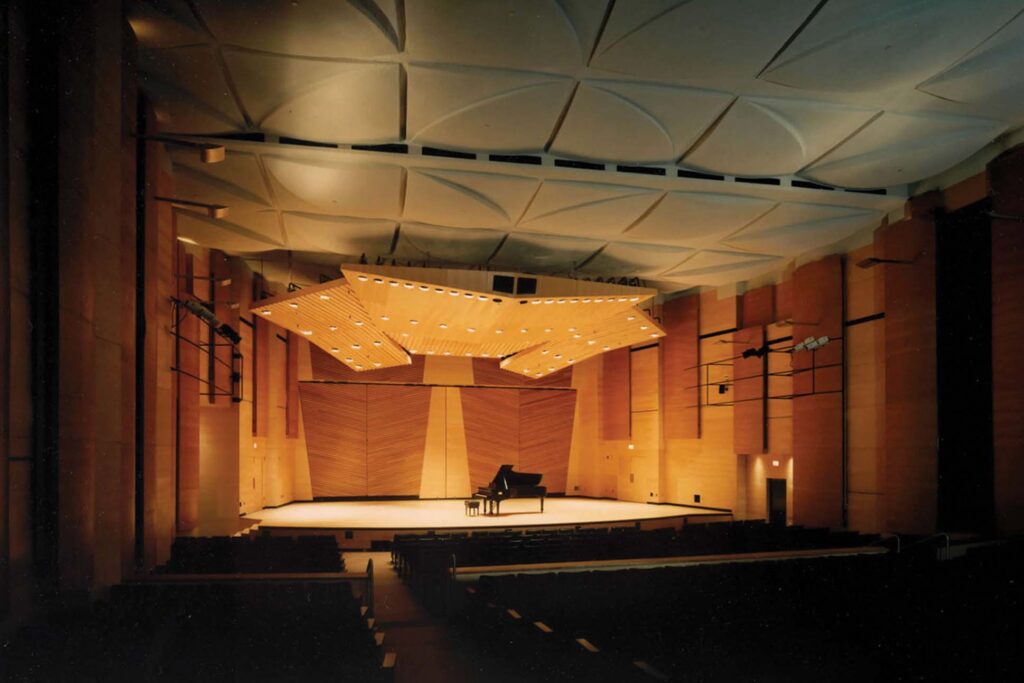 a stage with a piano in the middle