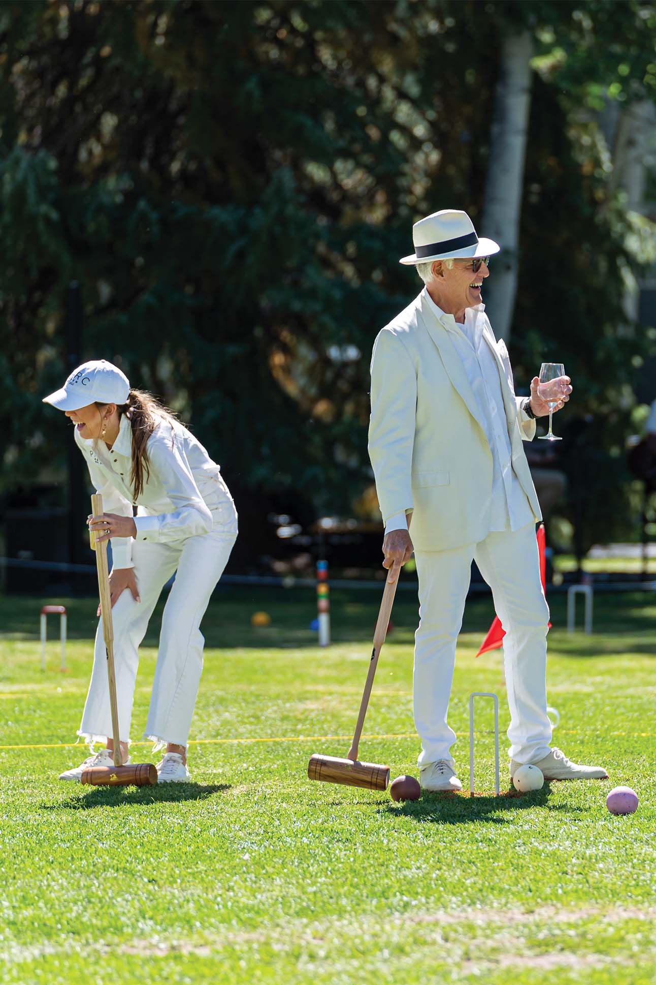 Aspen Croquet Club Members on the field enjoying wine and games.